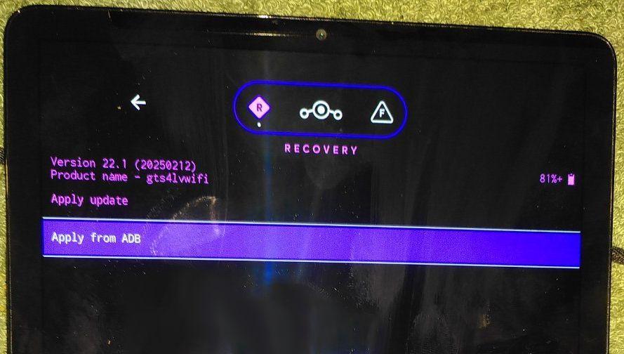 Black screen, pink 'Recovery' headline, some more pink text, white menu entry with blue background reading 'Apply from ADB'